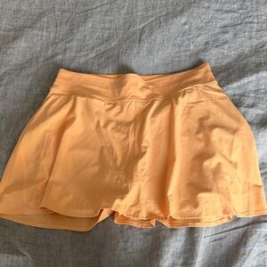 Lululemon running skirt. Pockets in shorts. Size 8.